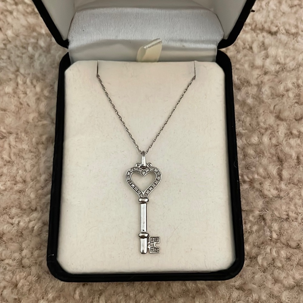 Sterling silver heart and key necklace with diamond accents from Kay Jewlers